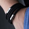 Detail view bracelet leather black braided and sailing rope black combination on wrist, Shrimp from Fischers Fritz