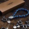 Keychain Fischers Fritze navy blue white blue, packing, ring and scarf on workbench